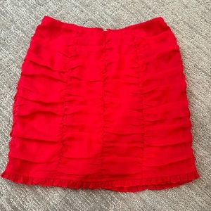 Francesca’s Miami red ruched mini skirt, size medium. Never worn